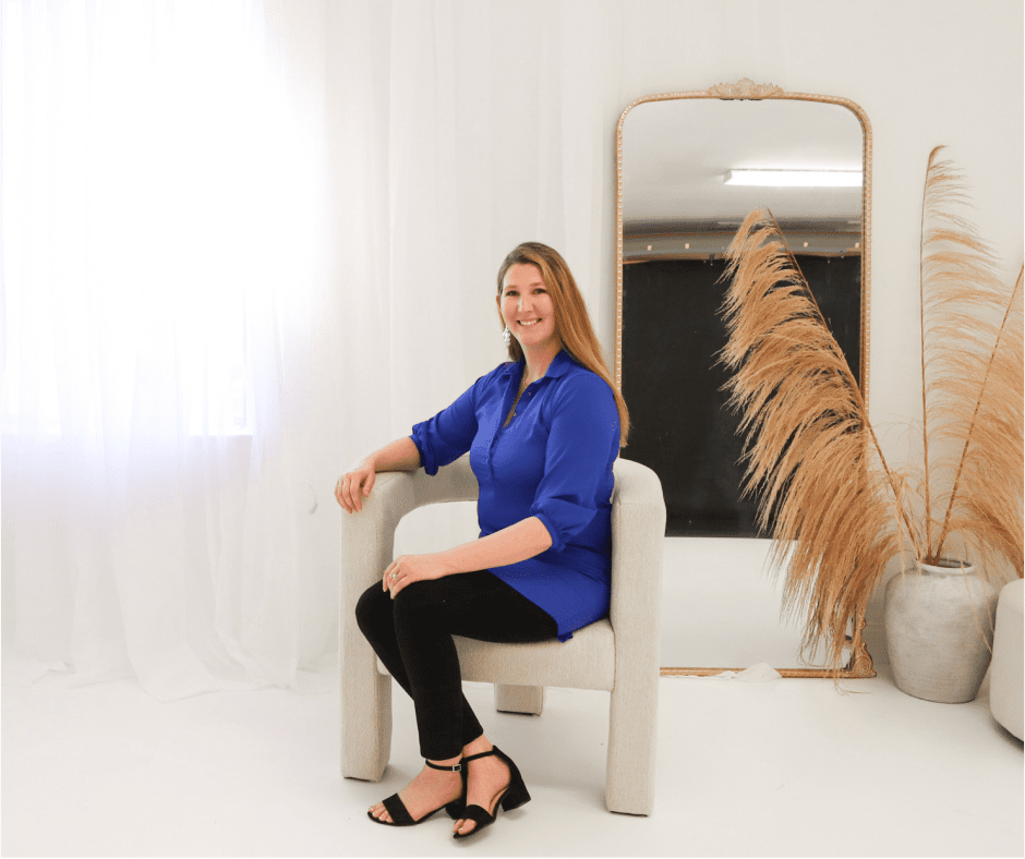 a person sitting at a desk working on a laptop